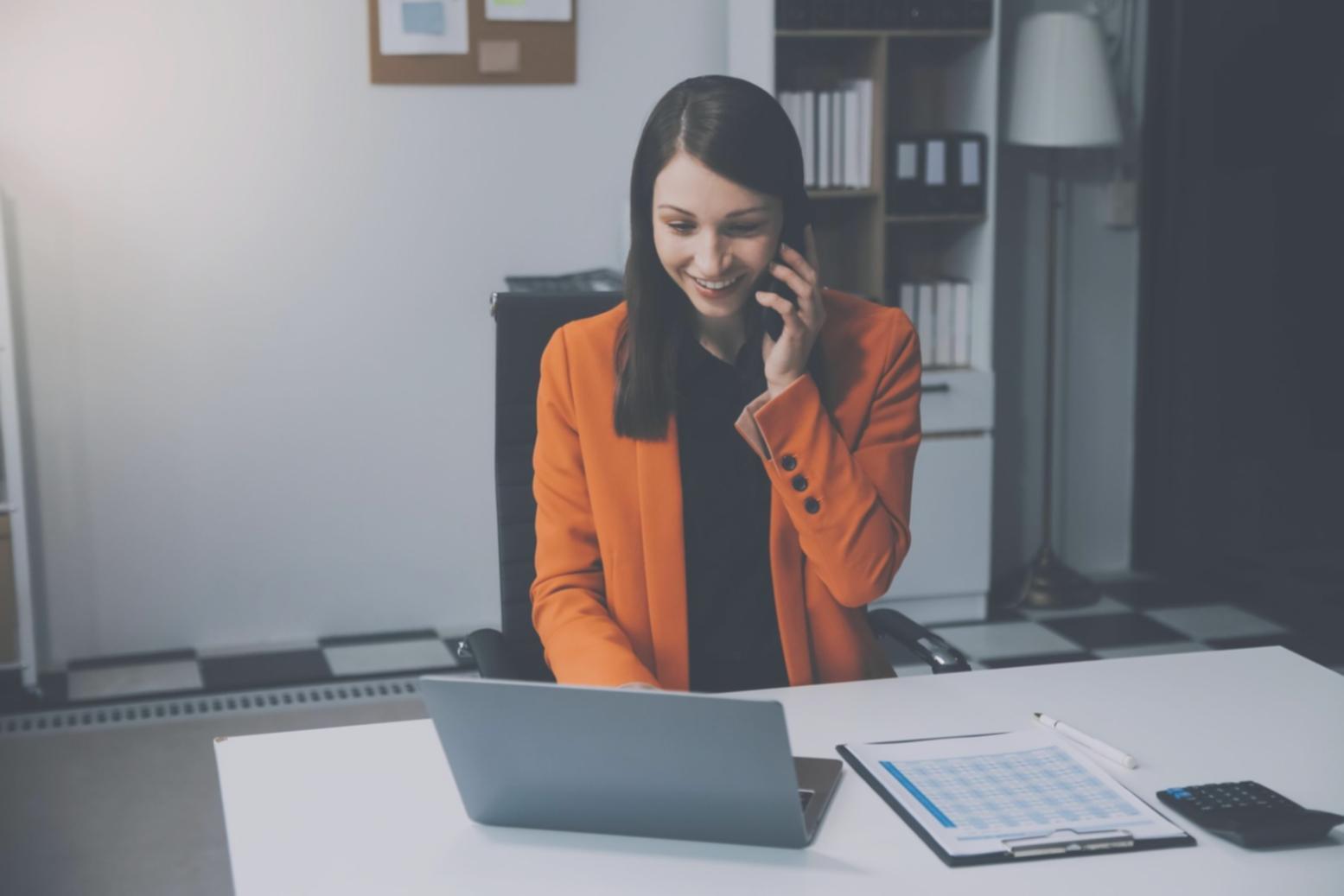 Students collaborating on financial analysis project in modern learning environment