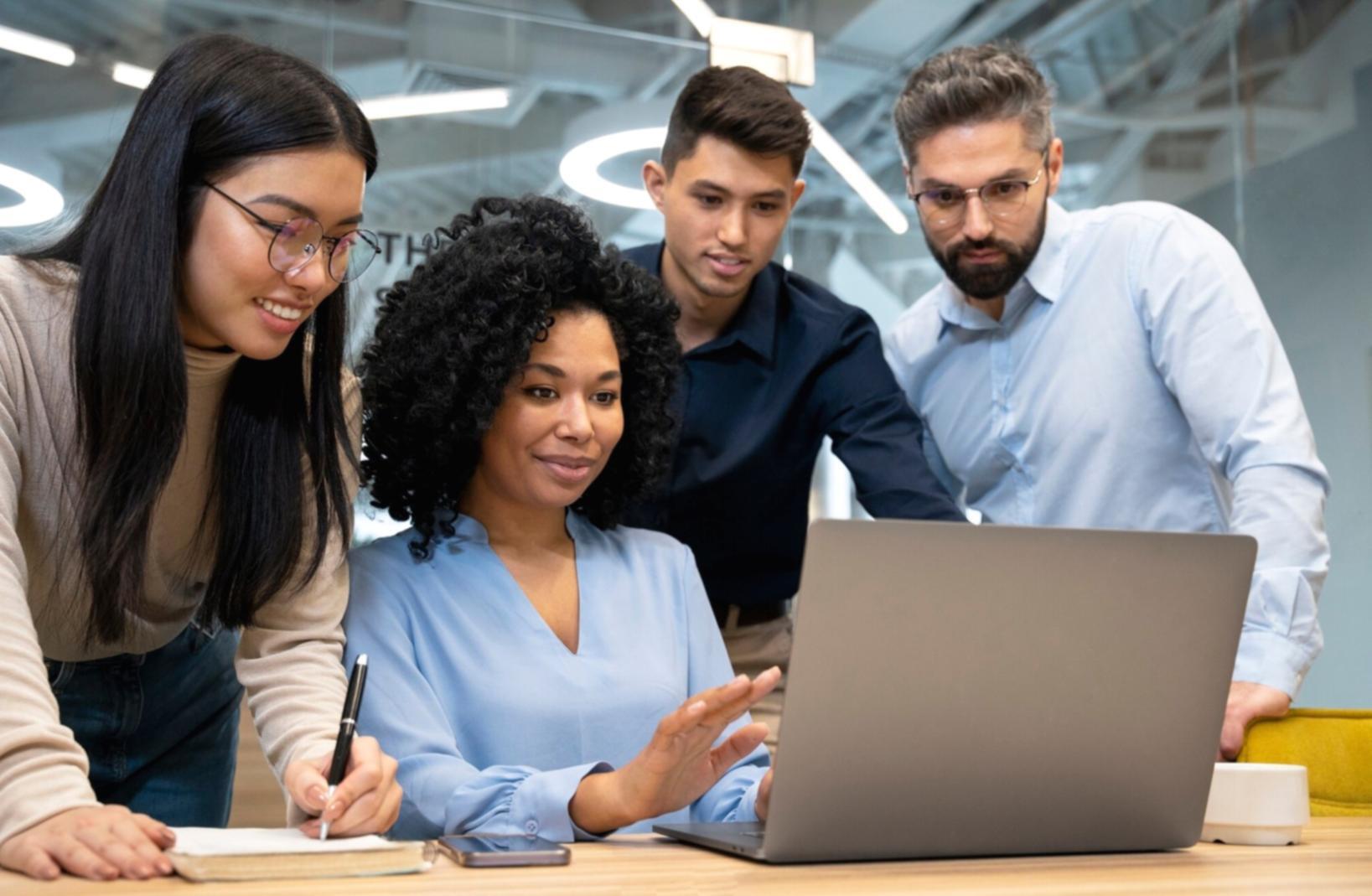 Finance team collaborating on working capital analysis project